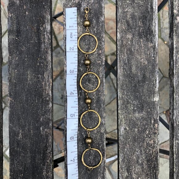 Hammered circle rings bracelet in antique bronze - Picture 3 of 5